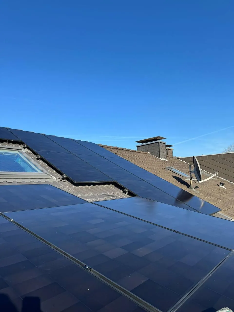 Photovoltaikmodule auf dem Schrägdach eines Einfamilienhauses in Oberhausen